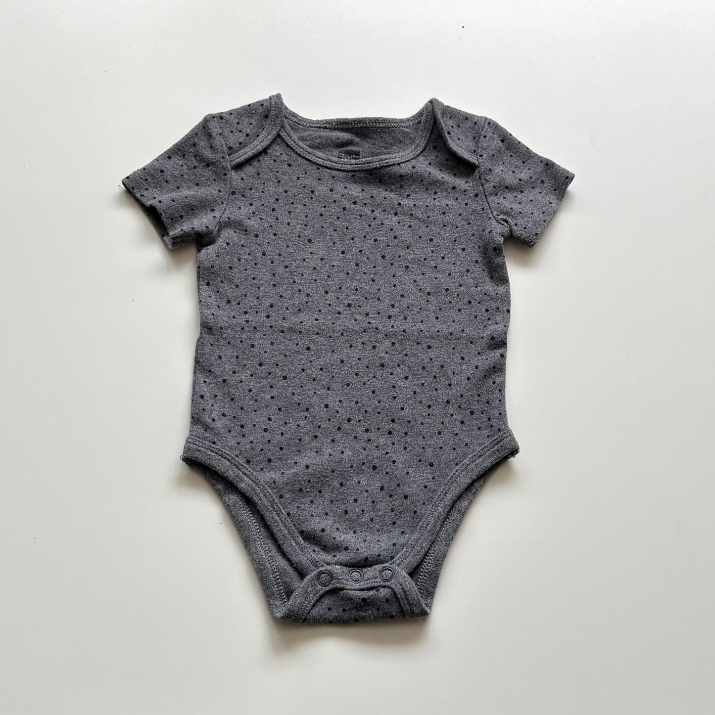 Cache-couche Tag | 9 mois