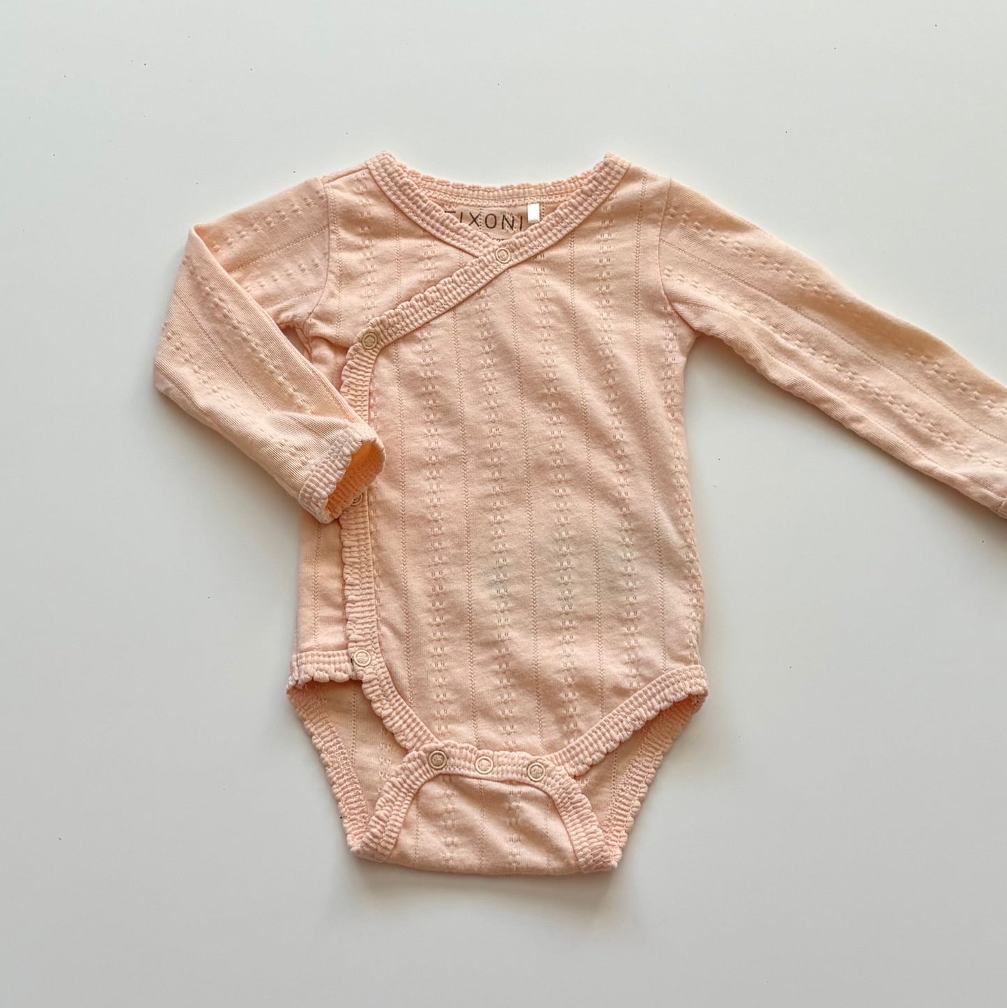 Cache-couche Fixoni | 0-1 mois