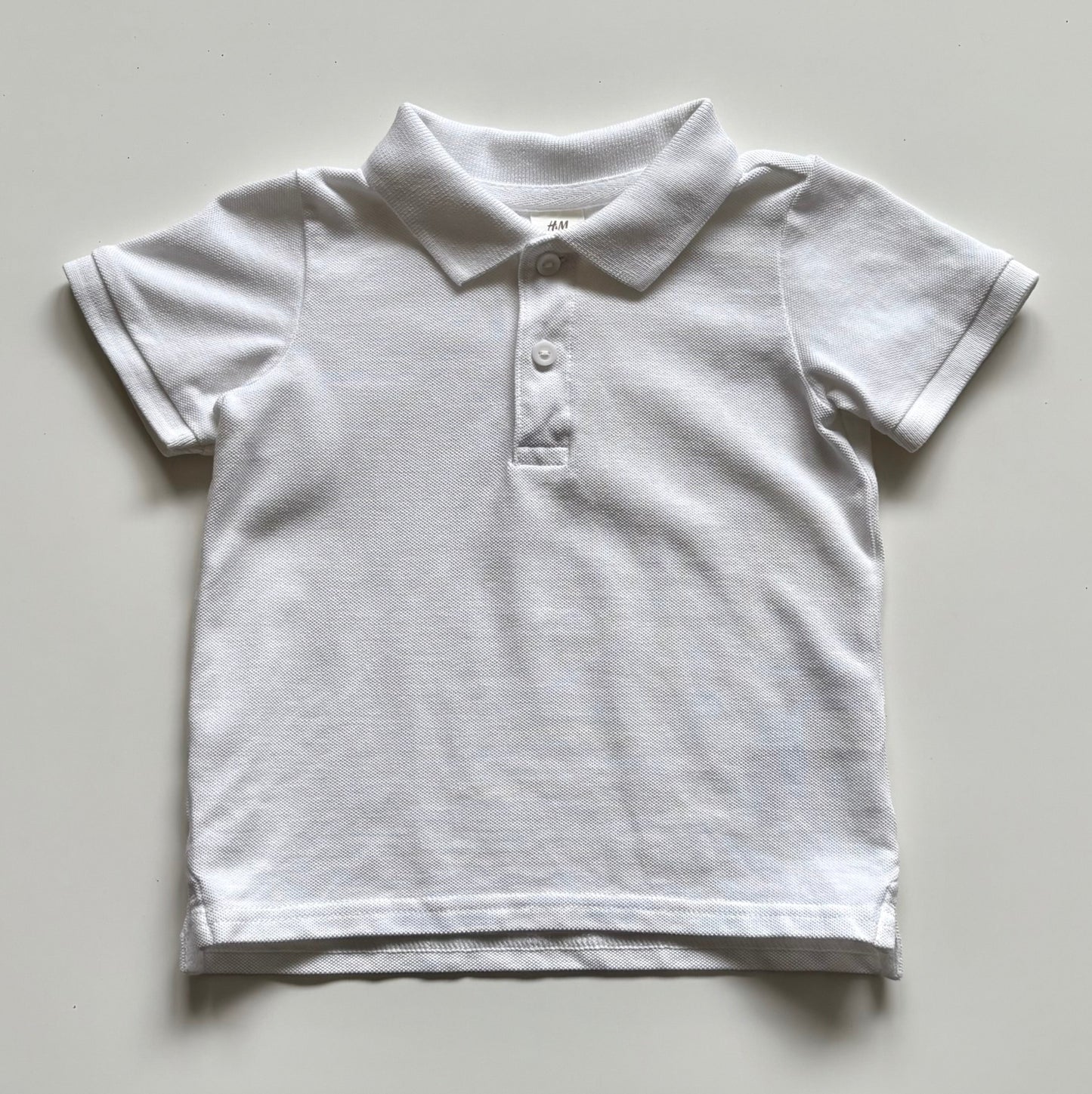 T-Shirt polo H&M | 9-12 mois