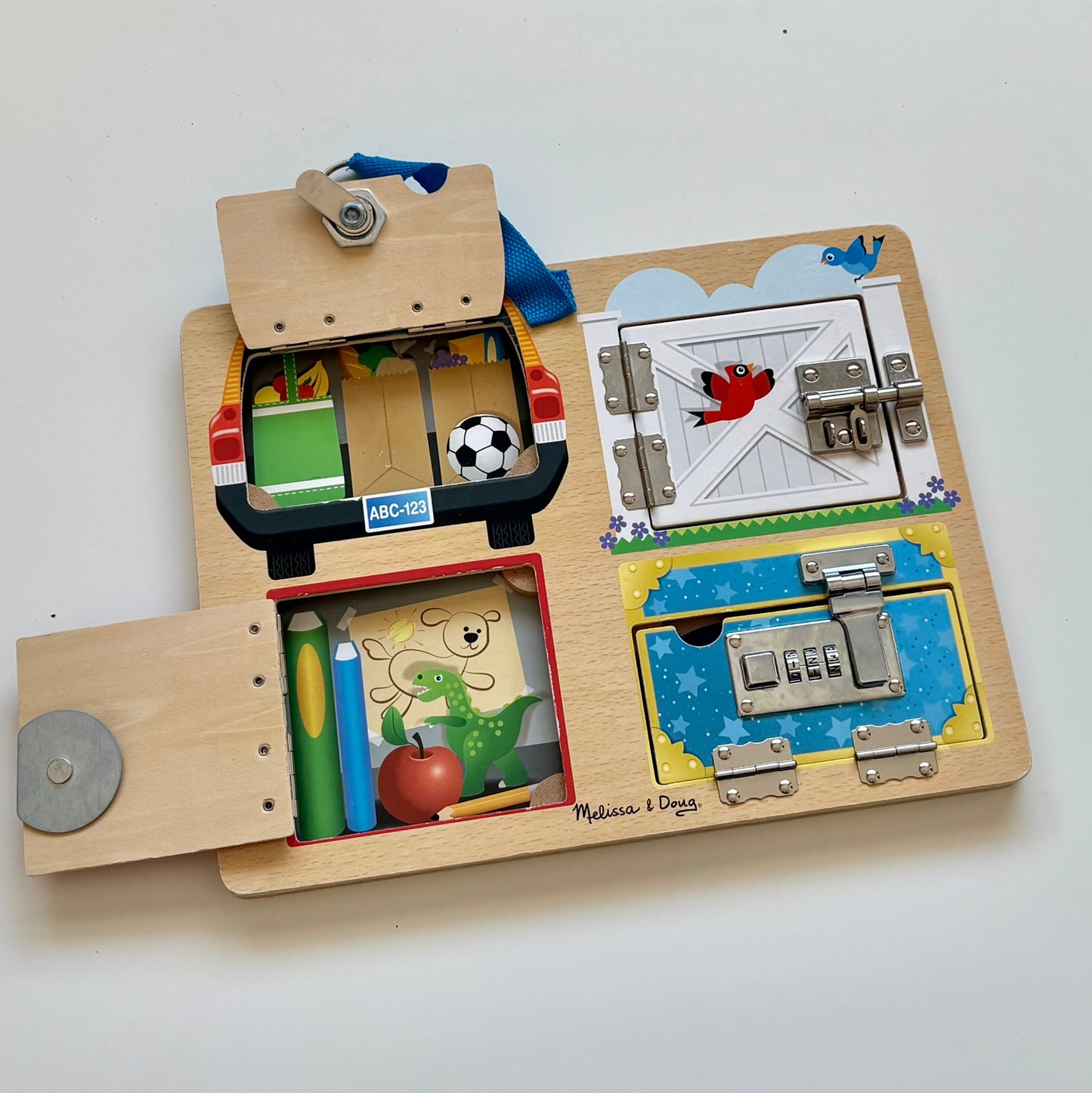 Planche en bois avec serrures & verrous | Melissa & Doug